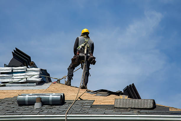 Professional Roofing technician working in Walpole, MA
